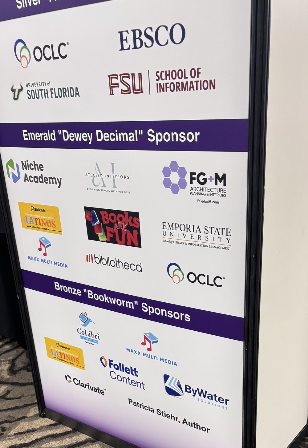 Florida Library Association conference sponsor board. MaxX Multi Media appears in the Emerald "Dewey Decimal" tier alongside OCLC, Niche Academy and bibliotheca, and again among the Bronze "Bookworm" sponsors.